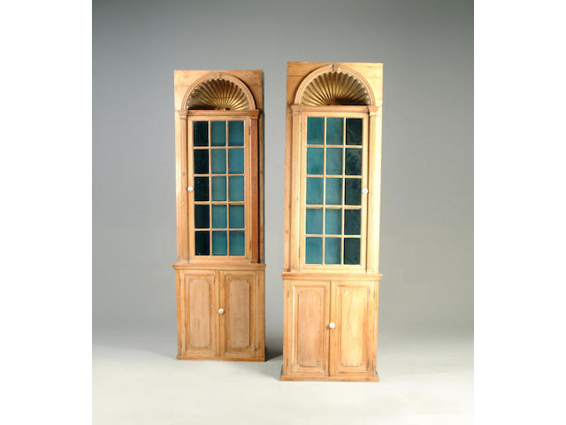 A pair of 19th century pine display cabinets