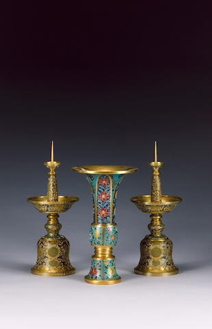 A cloisonne enamel gu-shaped beaker vase; and a pair of candlesticks;