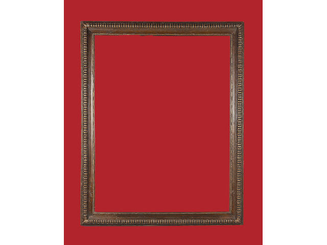 An Impressive Italian early 16th Century parcel-gilt and walnut veneered frame,