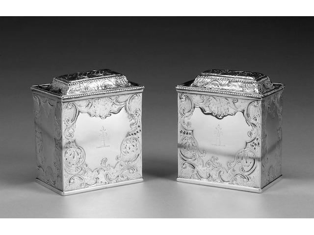 A pair of early George III silver tea caddies, by Samuel Taylor, London 1761, maker's mark and lion passant to cover,