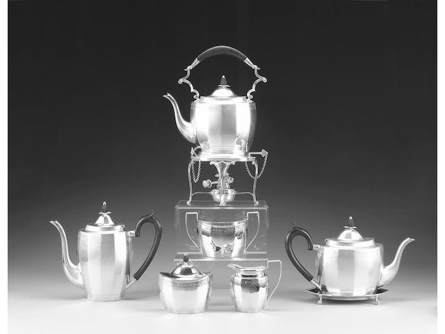 A good seven piece silver tea and coffee service in the George III manner, by E. J. Greenberg, London 1926, the burner by the same maker, stamped with lion passant and date letter for Birmingham 1926, incuse stamped "Sterling Made in England for Bailey Banks & Biddle",