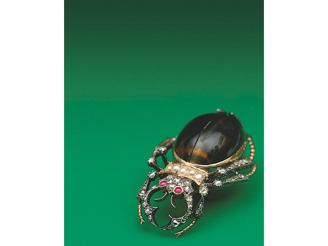 A Victorian gold and silver mounted gem set beetle