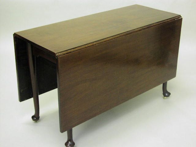 A 19th Century mahogany rectangular gateleg dining table