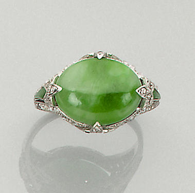 An art deco jade and diamond ring