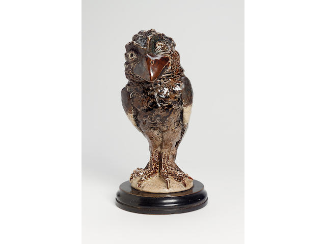 Martin Brothers, 1899 A Stoneware Grotesque Bird Jar and Cover