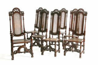 A set of seven late 17th Century fruitwood chairs,