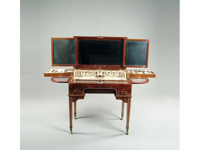 An early 20th century mahogany, thuya and ivory inlaid ladies dressing compendium made by Asprey of London Rd No 541493