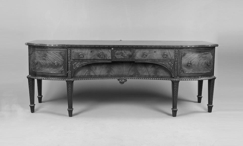 A large George III style mahogany sideboard