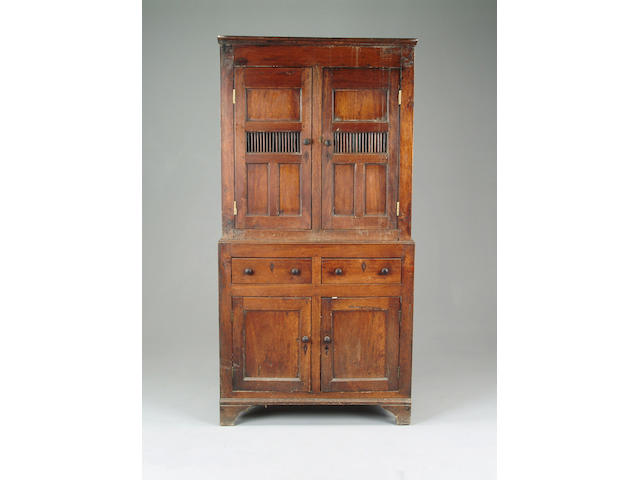 A mid 18th century walnut food cupboard,