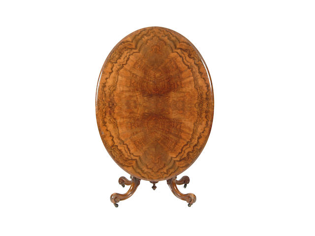 A Victorian figured walnut oval supper table,
