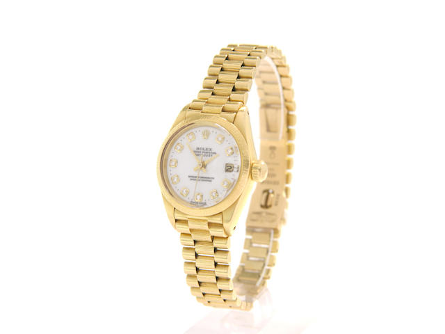 Rolex. A lady's 18ct gold and diamond set automatic bracelet watch Ref:6900, 1980s