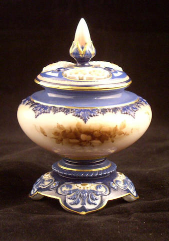 A Hadley Worcester vase and cover