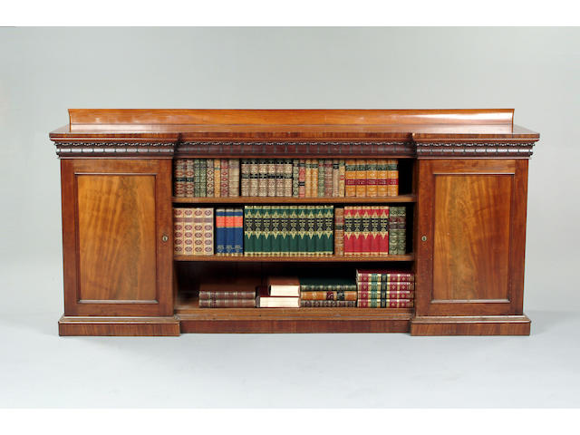 A William IV mahogany inverted breakfront open bookcase