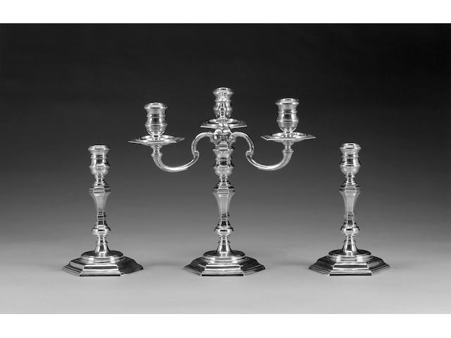 A cast silver three-light candelabra and matching pair of candlesticks, by R. Comyns, London 1964,