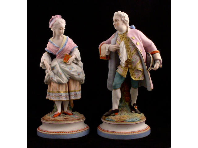 A pair of French porcelain figures