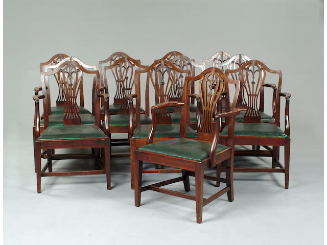 A set of twelve George III mahogany dining chairs