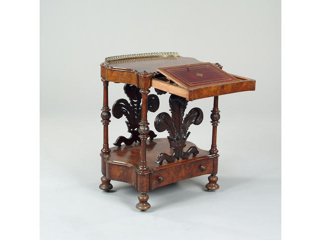 A Victorian walnut writing table