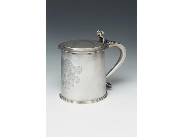 A Charles II tankard, maker's mark IA in a dotted circle, 1697, fully marked to cover and side, maker's mark to handle,
