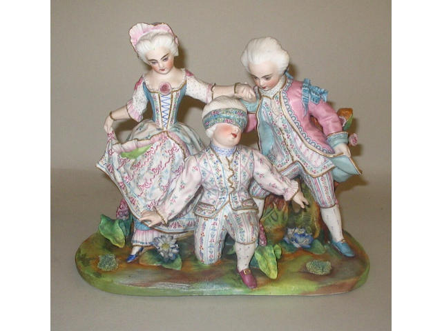 A French coloured bisque figure group of three children,