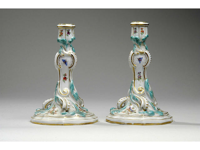 A pair of Meissen porcelain candlesticks,