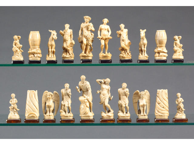A carved ivory  classical mythological Chess Set,