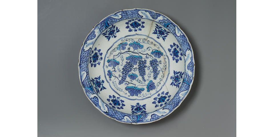 An important Iznik blue and white pottery "Grape Dish" Turkey, circa 1525
