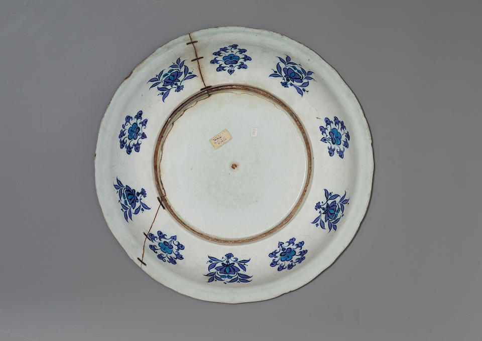 An important Iznik blue and white pottery "Grape Dish" Turkey, circa 1525