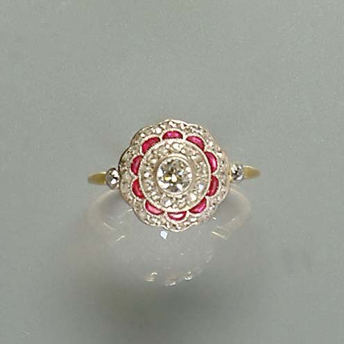 A diamond and synthetic ruby cluster ring