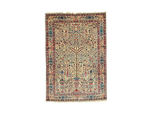 A Tehran rug Central Persia, 6 ft 11 in x 4 ft 9 in (210 x 145 cm)