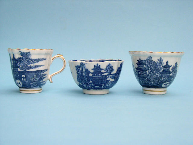 A Caughley coffee cup, sugar bowl and tea bowl