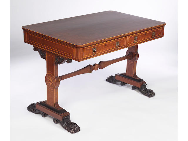 A late Regency rosewood and lined centre table,