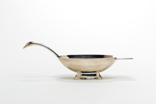 A 1930s Christofle electroplated metal sauce boat and ladle,