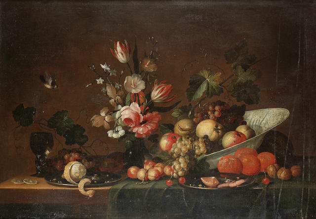 The Pseudo Simons (active the Netherlands, late 17th Century) Apples and grapes in a wan-li kraakware dish, 80 x 112 cm. (31&#189; x 44 1/8 in.)