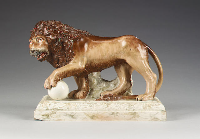 An enamelled pearlware model of a lion, circa 1795,