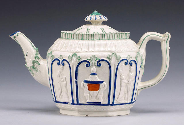 An Enoch Wood creamware octagonal section teapot and cover, circa 1790,