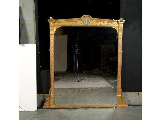 A mid 19th century gilt composition overmantle mirror