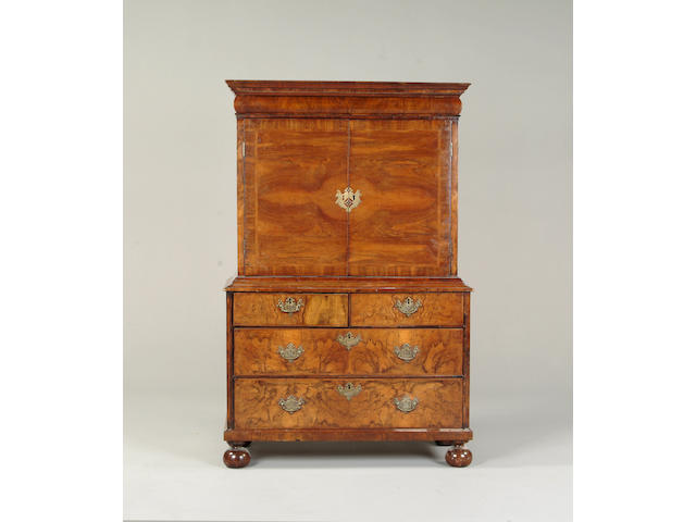 A late 17th century walnut cabinet on chest