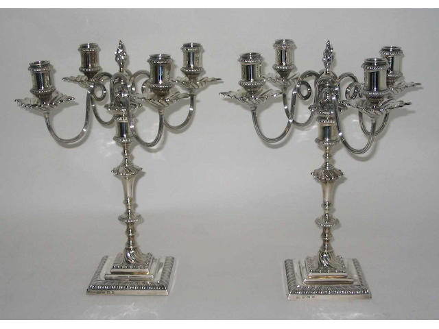 A pair of late 18th Century style four branch candelabra By Elkington and Co, Birmingham, 1913,