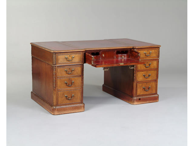 An early 20th century walnut partners desk