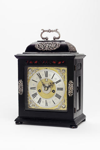 A fine and rare late 17th century silver mounted ebony veneered bracket clock with alarm and pull quarter repeat Fromanteel, London