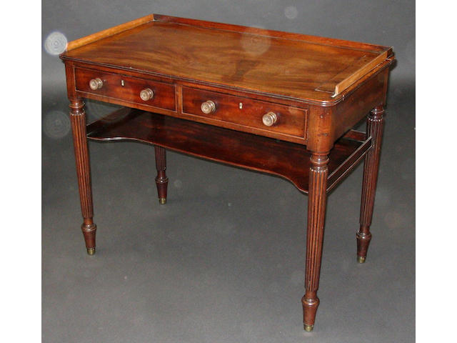 A Gillow style mahogany writing table