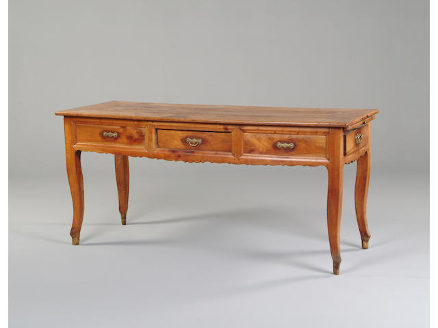 A late 19th century French chestnutwood table