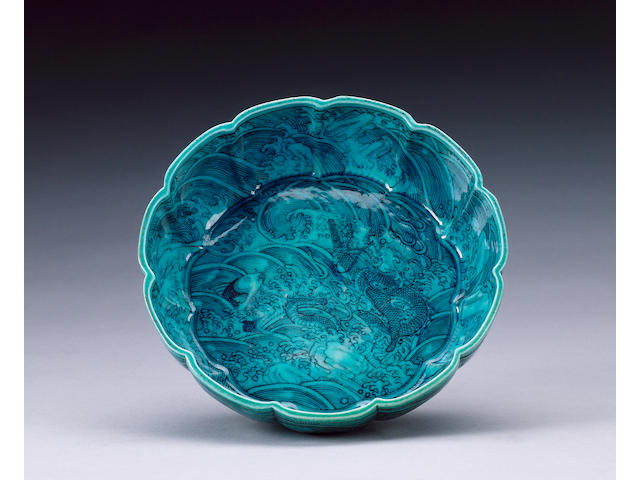 A turquoise-glazed dish of foliate form,