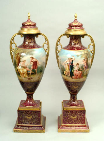 A large pair of Vienna style vases and covers