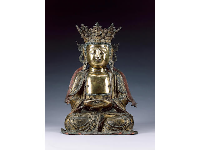 A Ming gilded bronze figure of a Buddhist Deity,