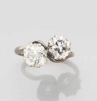 A diamond two-stone crossover ring