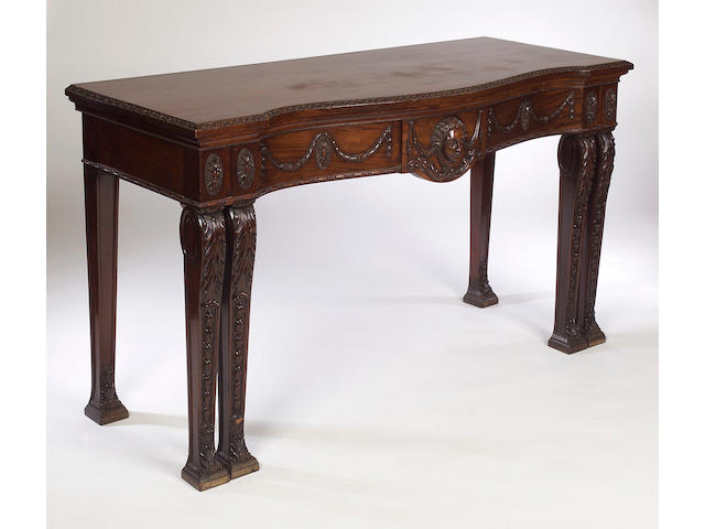 A George II style mahogany Serving Table,in the manner of William Kent,