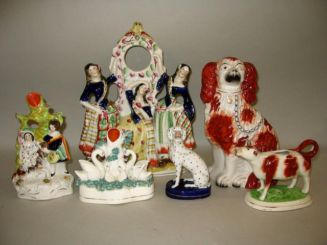 A collection of six Staffordshire figures,