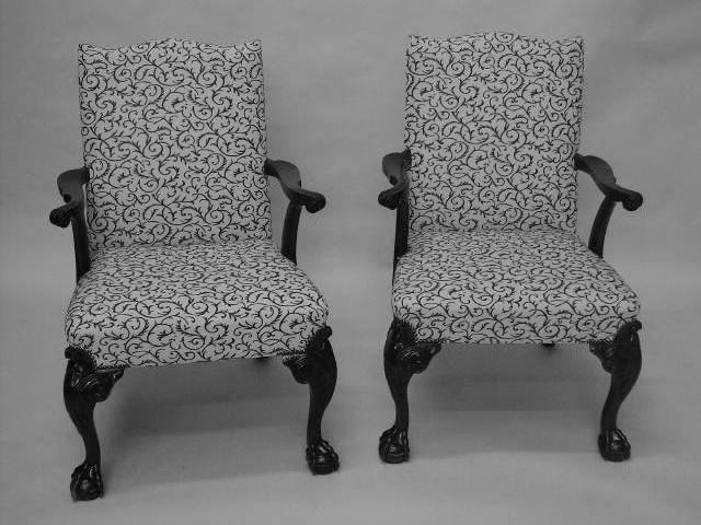 A set of four Chippendale style mahogany Gainsborough armchairs,
