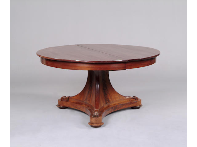A late 19th century continental mahogany extending dining table